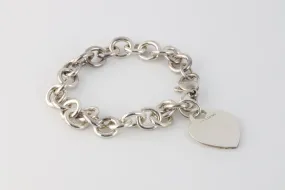 7.5" Tiffany & Co. 925 Silver Bracelet with Heart Charm (34.57g.)