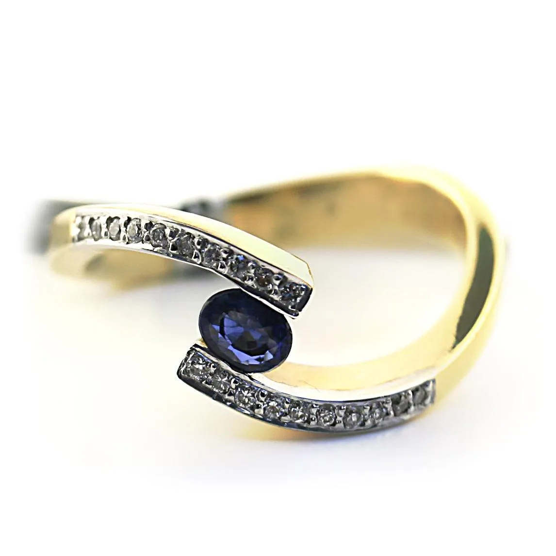 Blue Sapphire and Diamond Twist Band Ring Yellow Gold